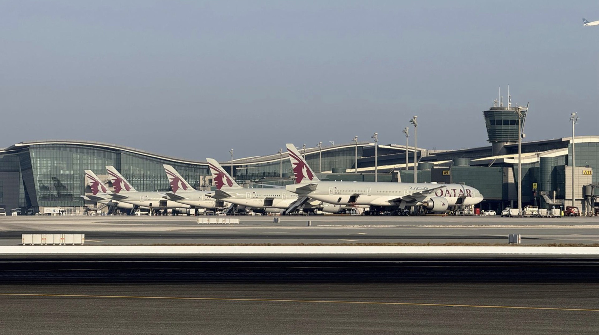 Commercial airport runway safety system with collapsible FOD barrier preventing aircraft engine damage