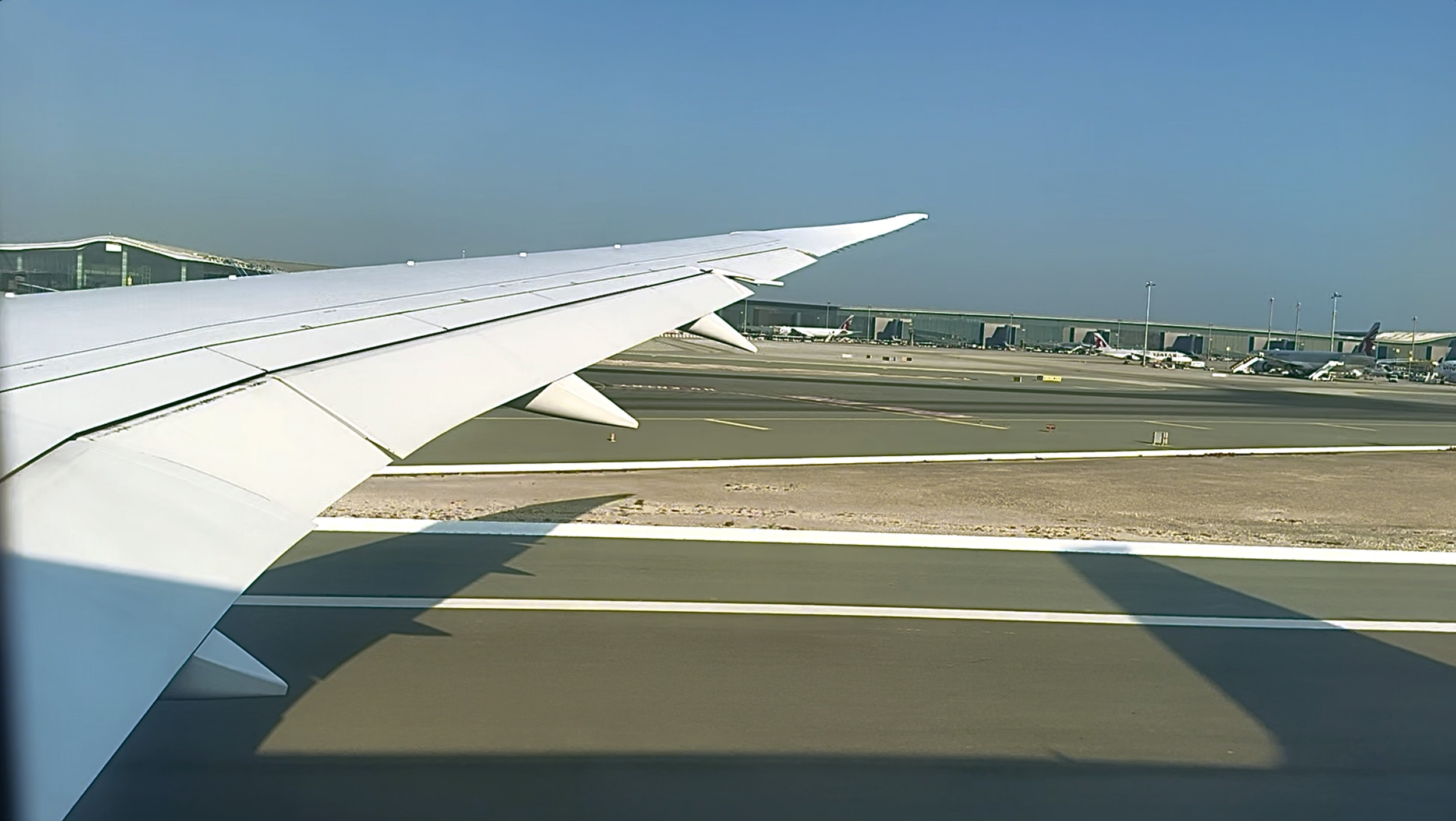 Commercial airport runway safety system with collapsible FOD barrier preventing aircraft engine damage