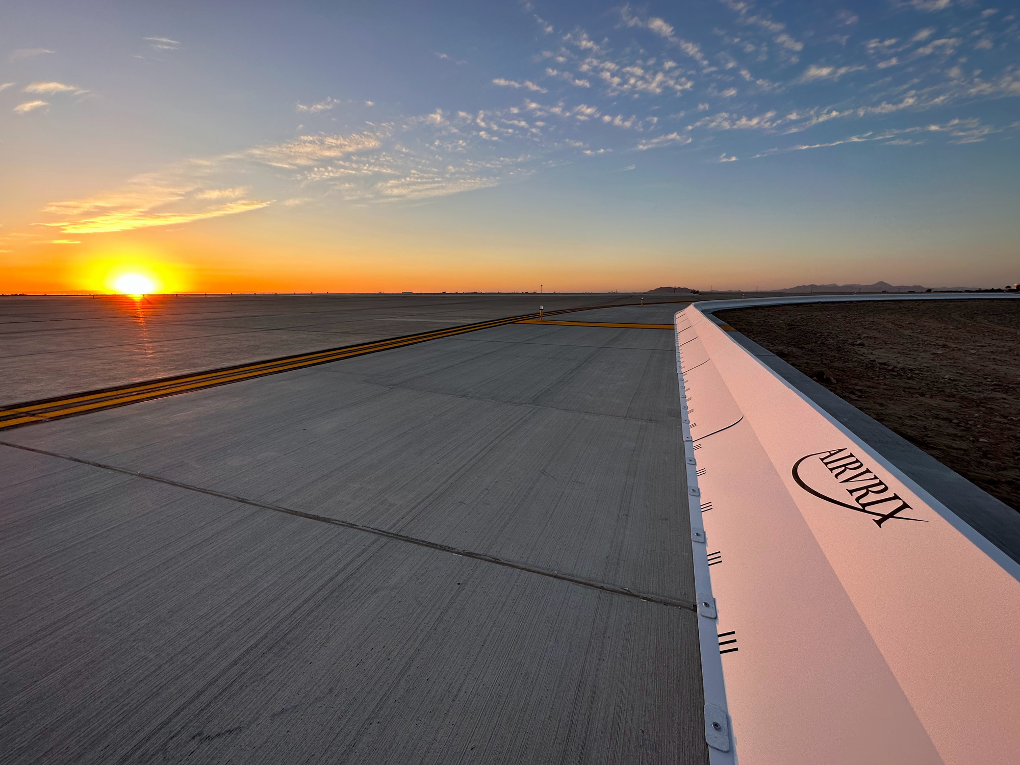 Commercial airport runway safety system with collapsible FOD barrier preventing aircraft engine damage