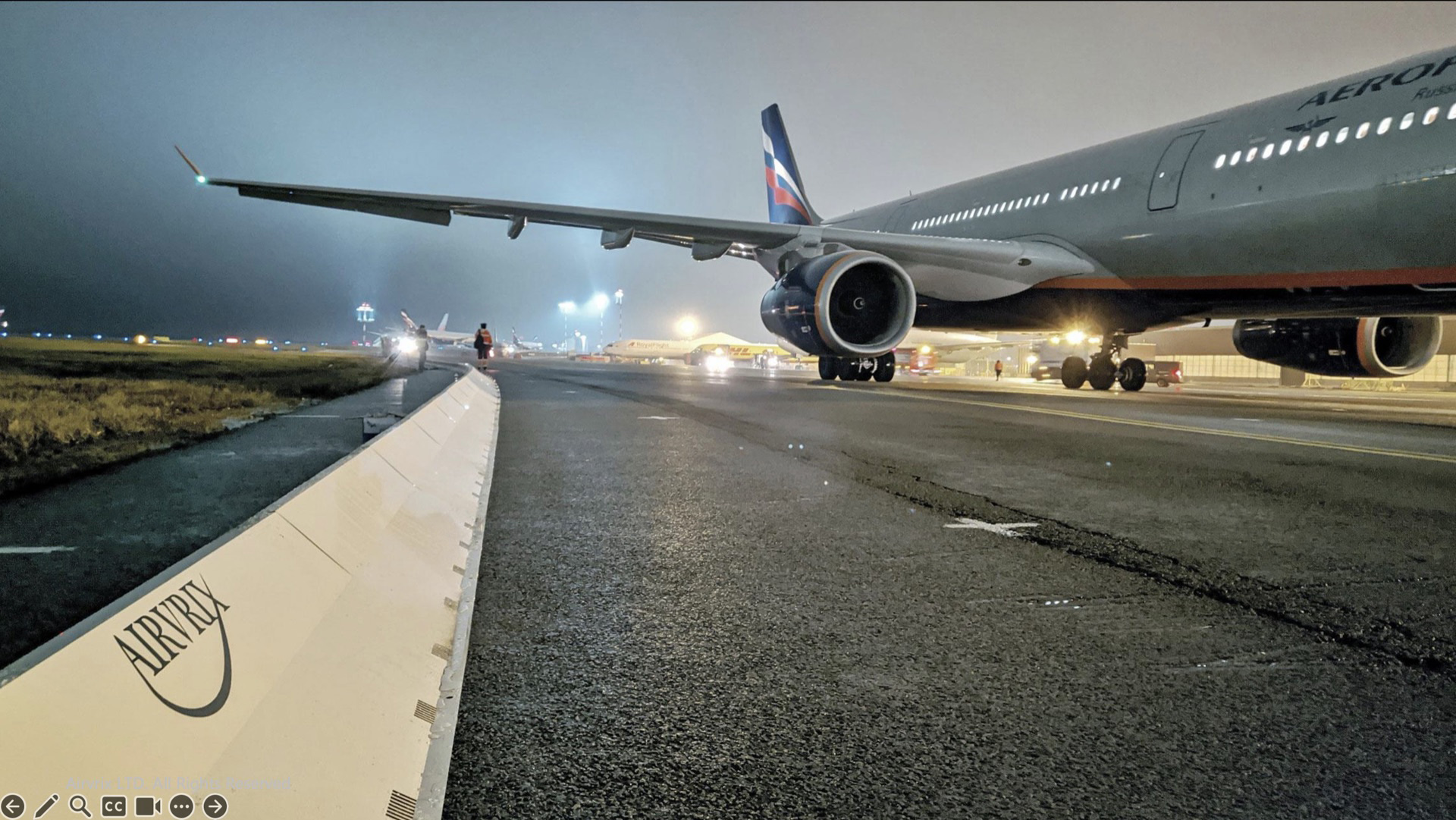 Commercial airport runway safety system with collapsible FOD barrier preventing aircraft engine damage