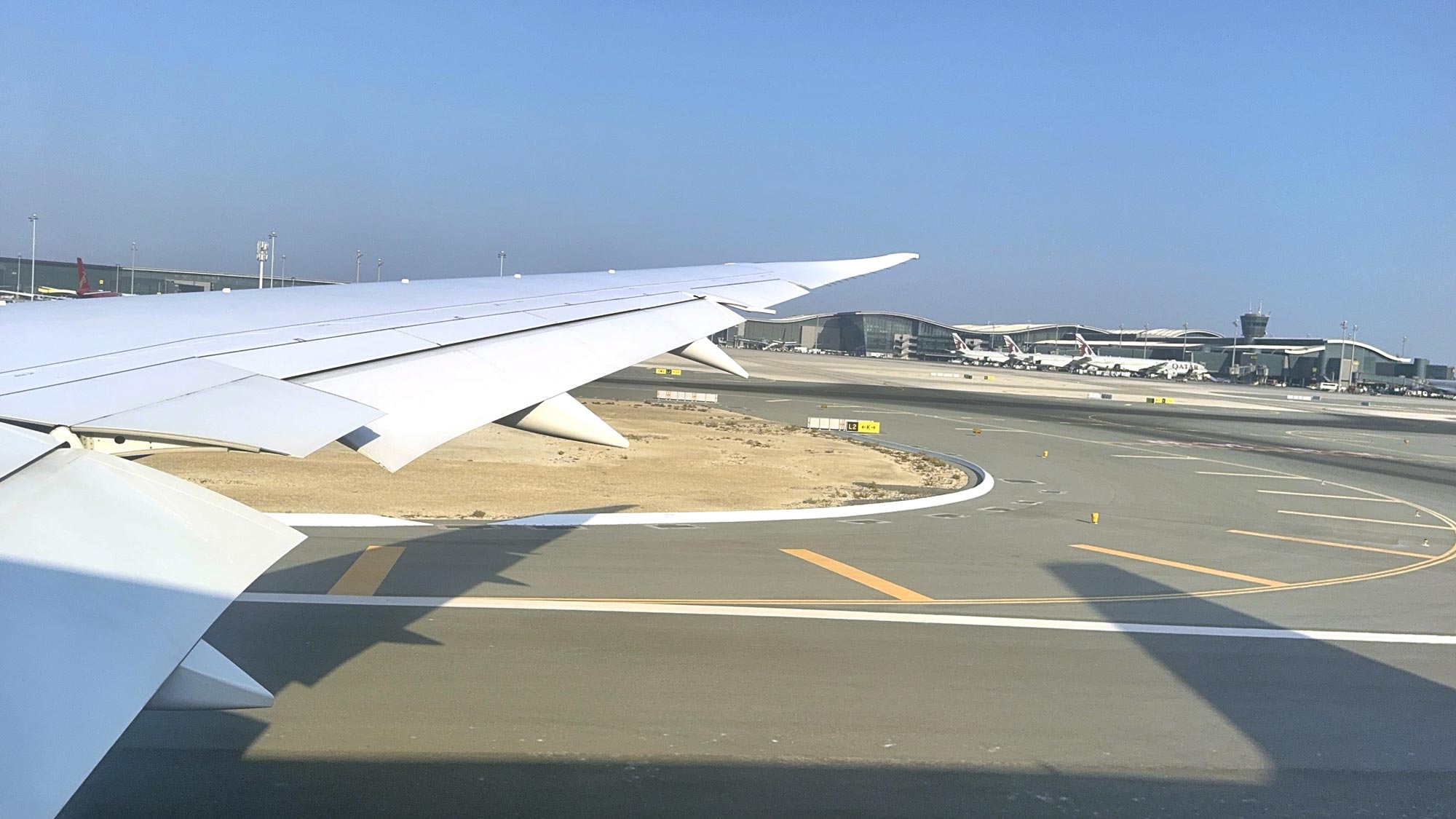 Commercial airport runway safety system with collapsible FOD barrier preventing aircraft engine damage