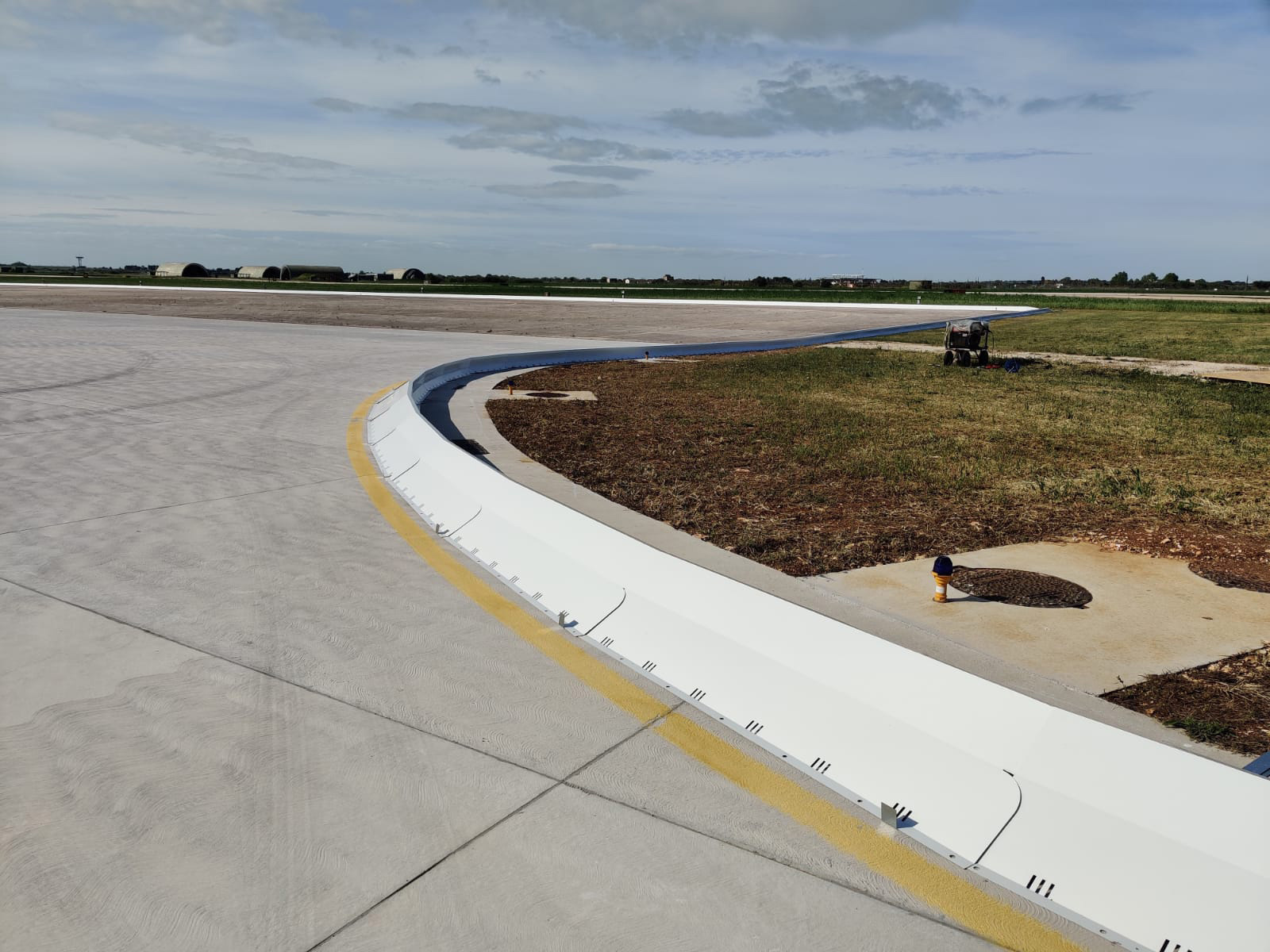 Military-grade collapsible FOD barrier protecting combat aircraft from foreign object damage