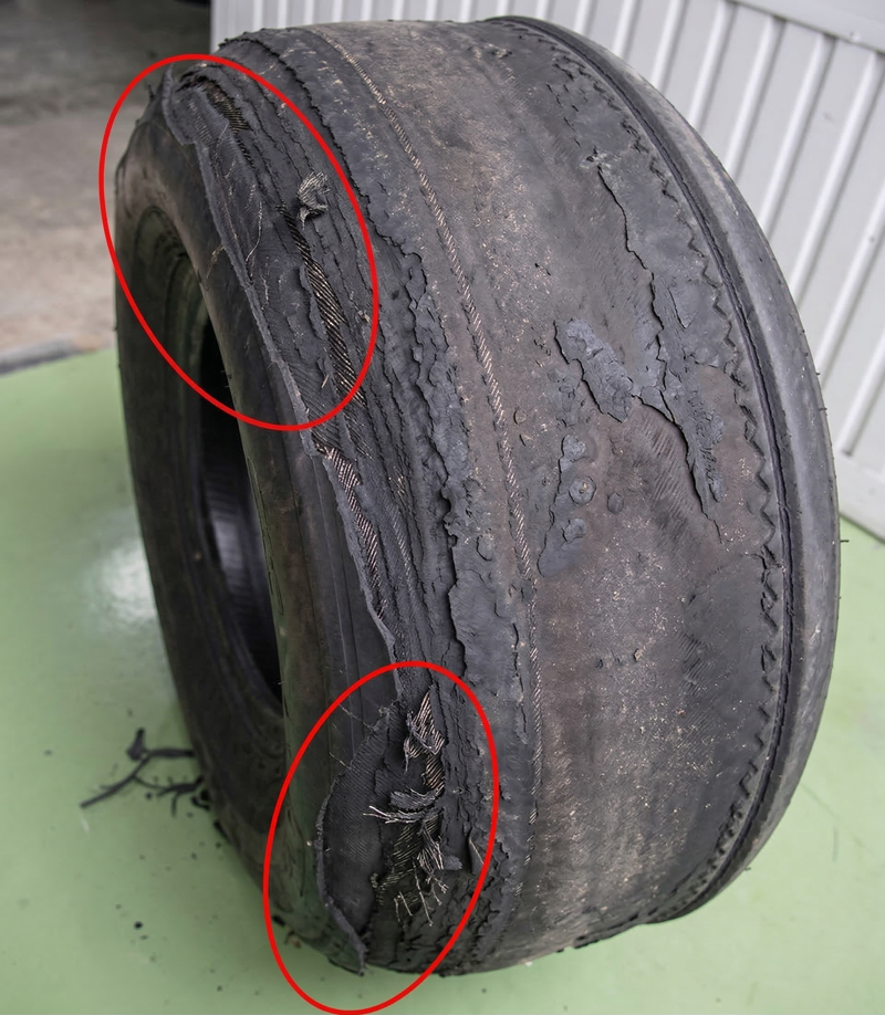 Aircraft landing gear tire damage from runway foreign object debris